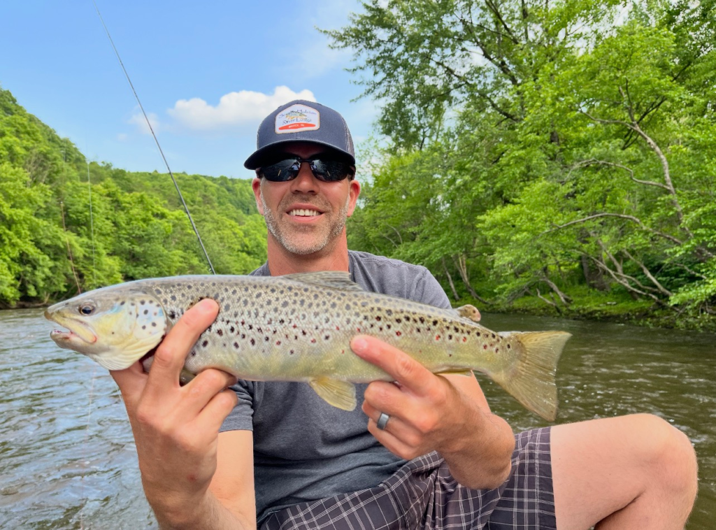 Fly Fisher Holding Fish on Lehigh River