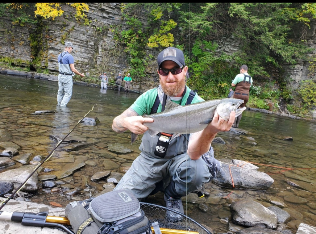 Fly Fisher Holding Fish on Lehigh River